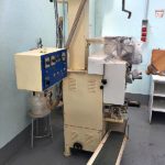 Insacchettatrice_erbe_essiccate_sottovuoto_attrezzatura_officina_meccanica
